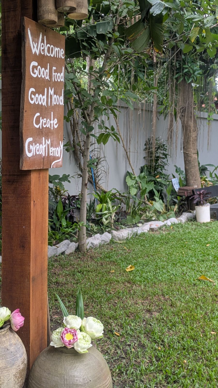 Welcome sign in the garden